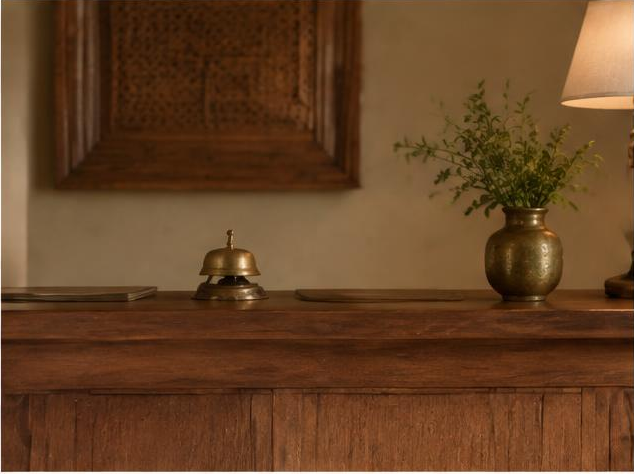 Teak reception desk and brass bell